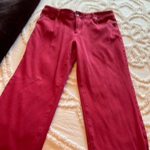 This is a pair of red stretch jeans